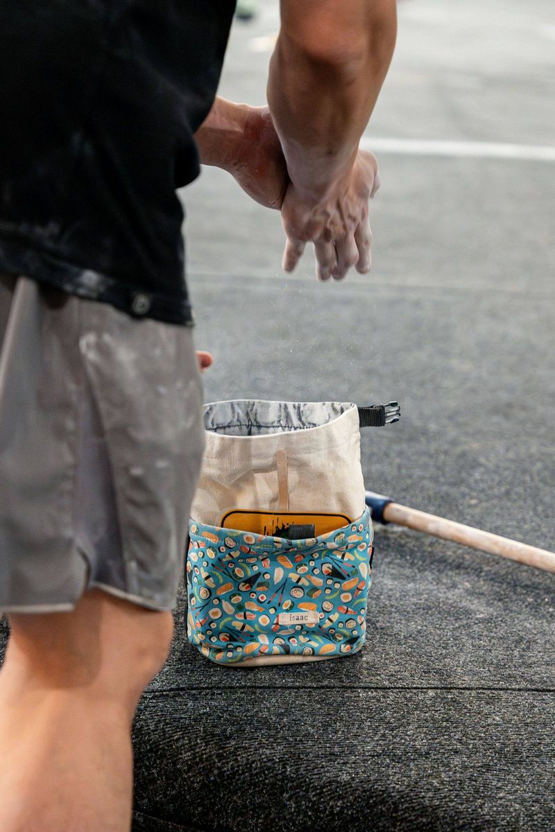 Chalkbeutel und Magnesiumkreide für das Bouldern